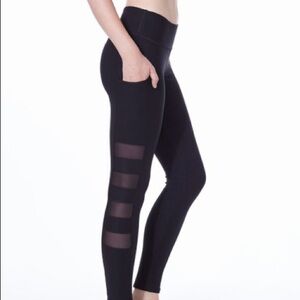 Gottex Studio great yoga pants with pocket and mesh sheer black squares on sides